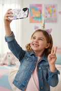 A phone case featuring a repeating pattern of pastel purple unicorns, rainbows, stars, and crescent moons on a white background.