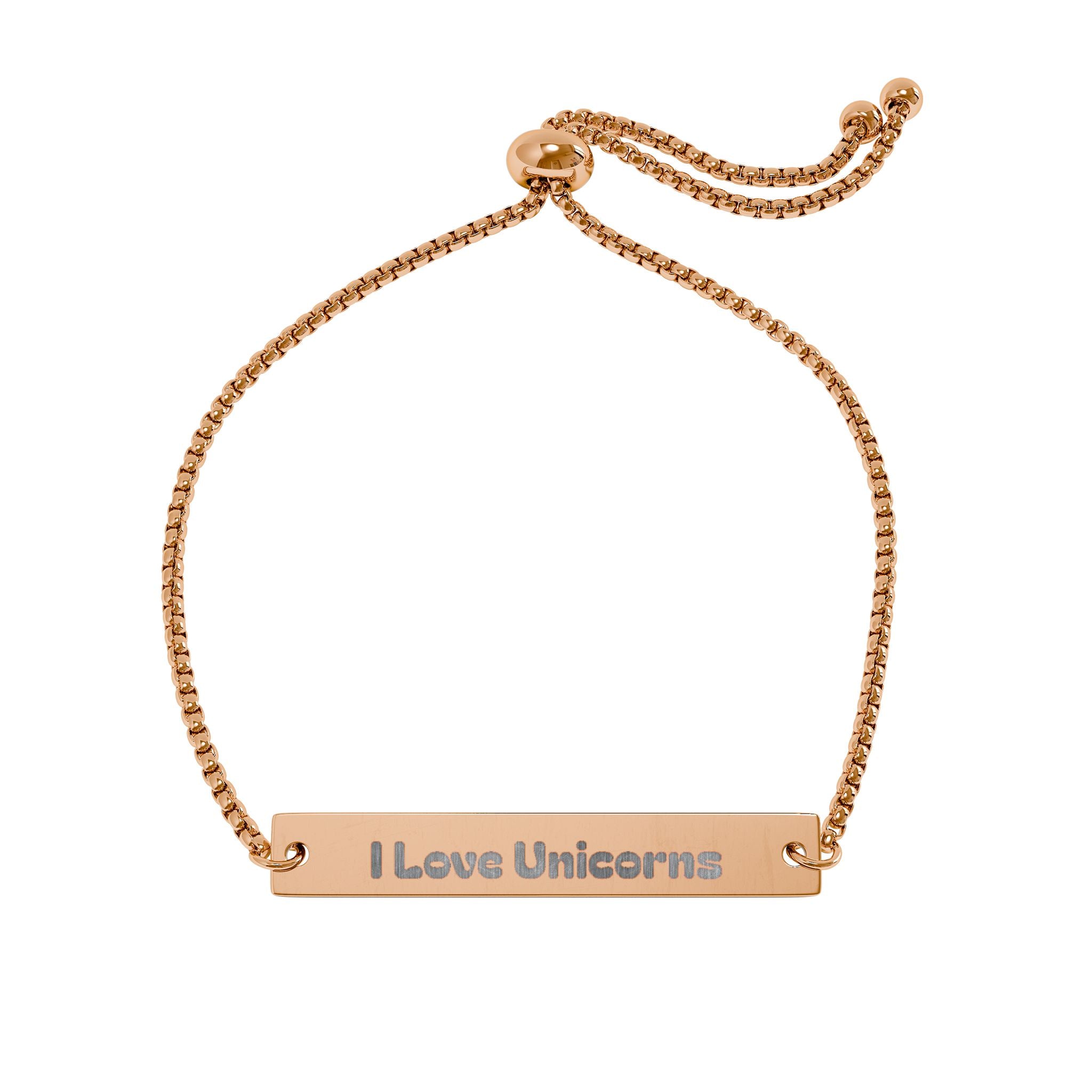 A rose gold adjustable chain bracelet with a horizontal bar engraved with the text 'I Love Unicorns' in a sans-serif font, set against a plain white background.