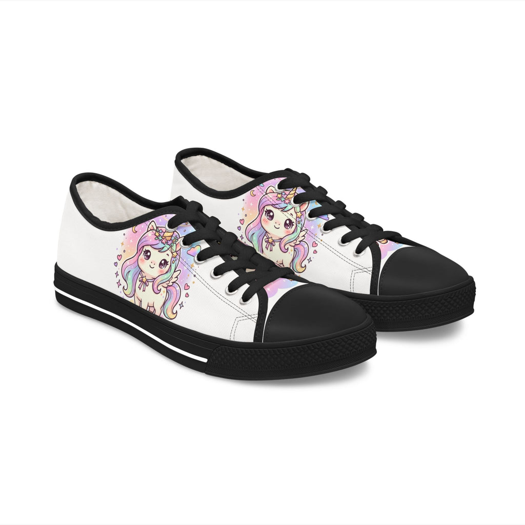 A pair of low-top canvas sneakers with a white upper, black toe caps, black laces, and black soles. The sides feature a colorful cartoon illustration of a cute unicorn girl with pastel rainbow hair and a horn.
