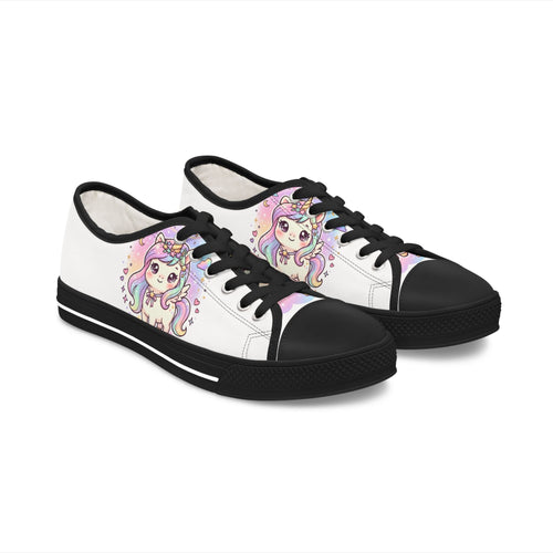 A pair of low-top canvas sneakers with a white upper, black toe caps, black laces, and black soles. The sides feature a colorful cartoon illustration of a cute unicorn girl with pastel rainbow hair and a horn.