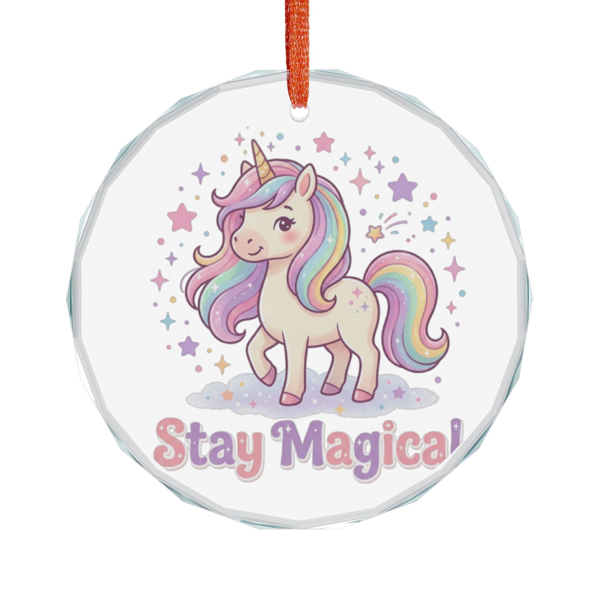 Round clear hanging ornament with a printed cartoon unicorn, pastel stars, and the words "Stay Magica!" in pink and purple lettering, suspended by an orange ribbon on a white background.